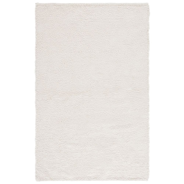 Renewal 8 ft. x 10 ft. Ivory Distressed Solid Area Rug