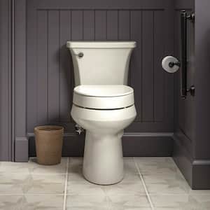 Hyten Elevated Quiet-Close Elongated Toilet Seat in Biscuit
