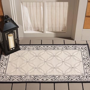 Courtyard Sand/Black Doormat 2 ft. x 4 ft. Border Indoor/Outdoor Patio Area Rug