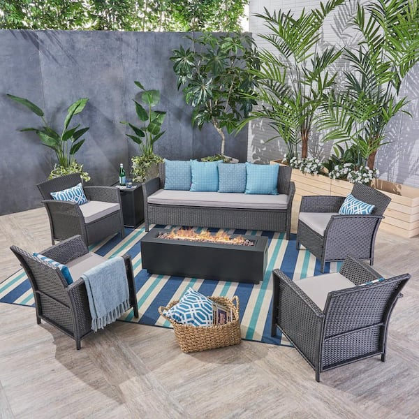 Noble House St. Lucia Gray 7-Piece Wicker Patio Fire Pit Conversation Set with Silver Cushions