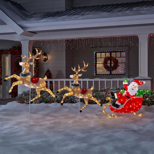 santa and reindeer roof decoration