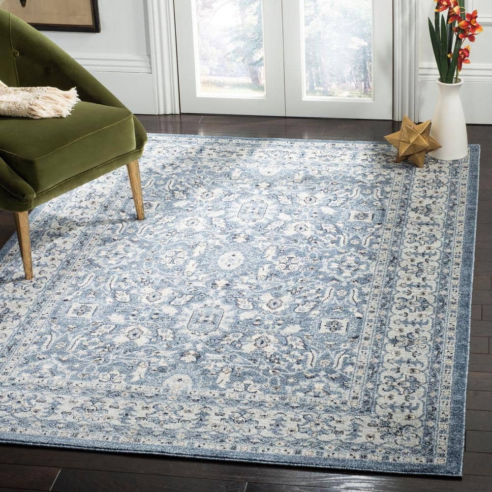 Blue Floral Motif Synthetic 6' x 9' Area Rug