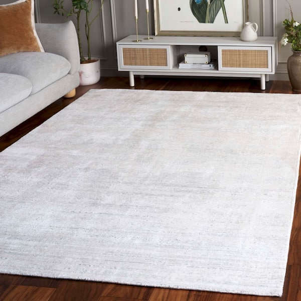 Mirage 6 ft. x 9 ft. Ivory Faded Abstract Area Rug