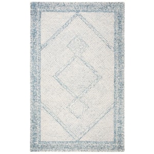 Abstract Ivory/Blue 6 ft. x 9 ft. Geometric Border Area Rug