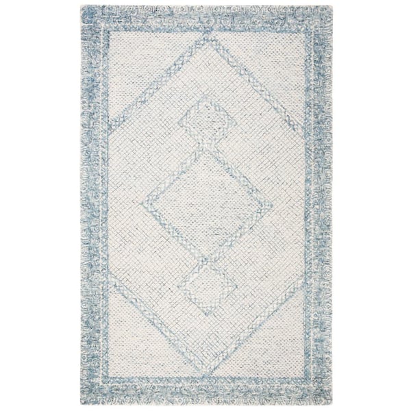 Abstract Ivory/Blue 6 ft. x 9 ft. Geometric Border Area Rug