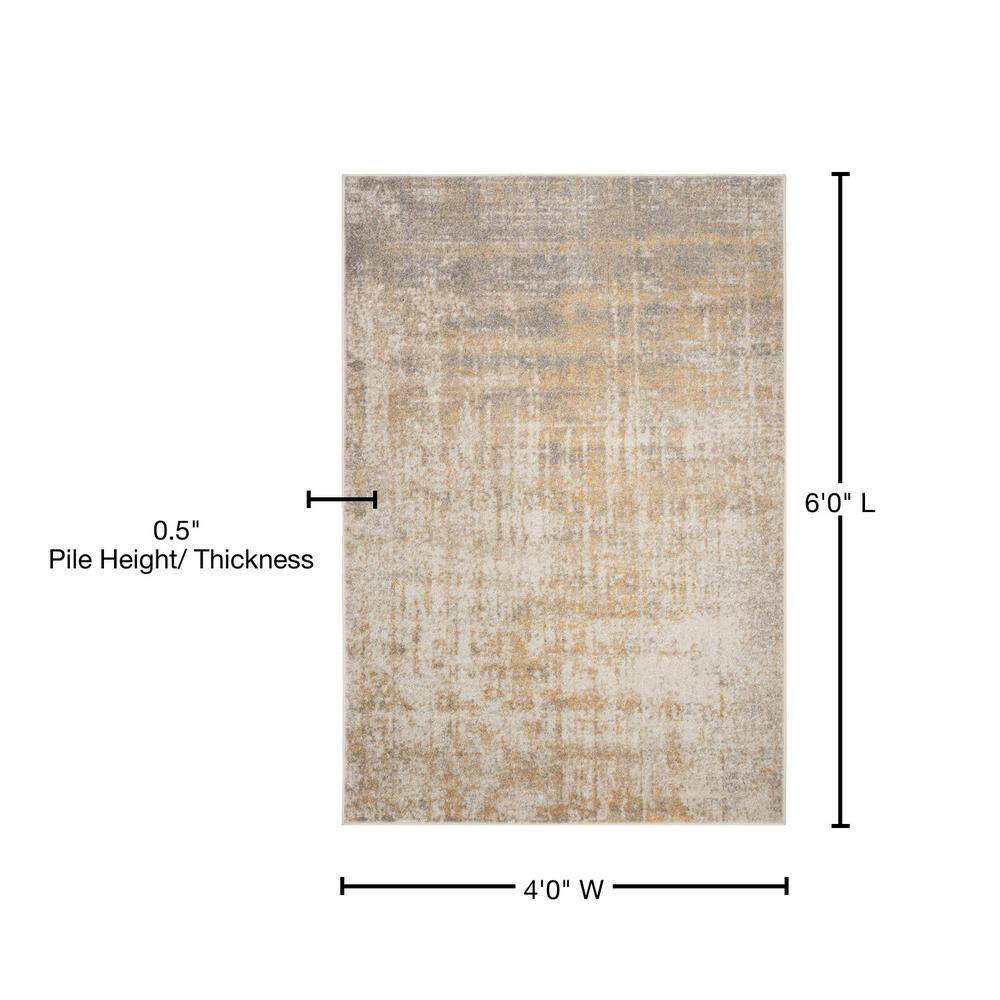 Creme and Gold Abstract Synthetic Area Rug 4' x 6'
