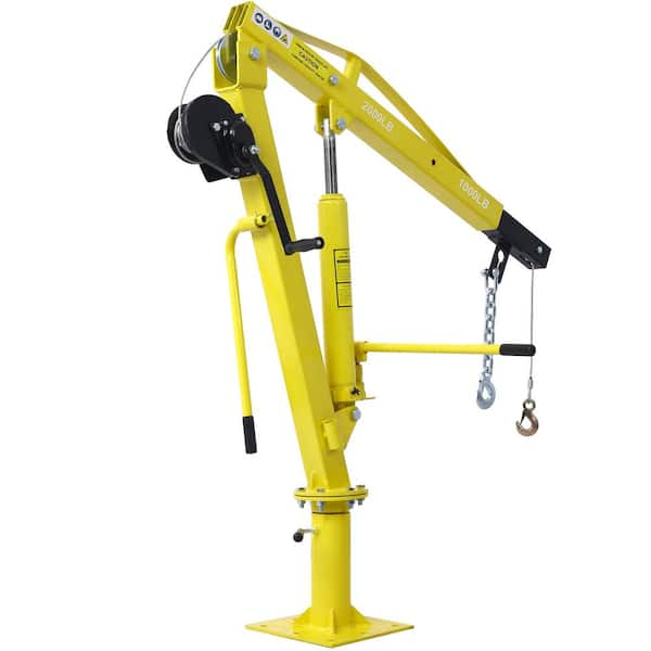 A small hydraulic crane as shown carries a 1000 ﻿lb