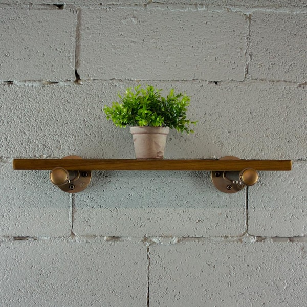 OS Home and Office Furniture Single brushed bronze pipe with reclaimed-aged wood bookshelf.