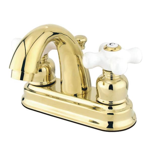 Kingston Brass Restoration 4 in. Centerset 2-Handle Bathroom Faucet with Plastic Pop-Up in Polished Brass