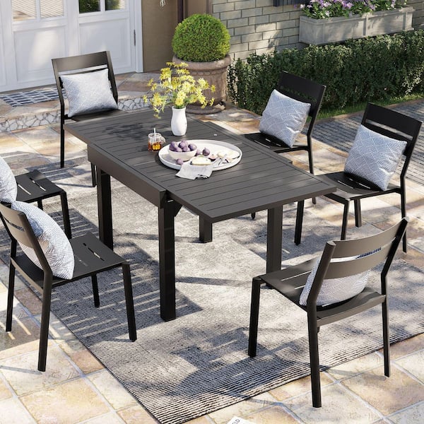 7-Piece Aluminum Rectangular Outdoor Dining Set with Expandable Table and Stackable Armless Chairs in Black