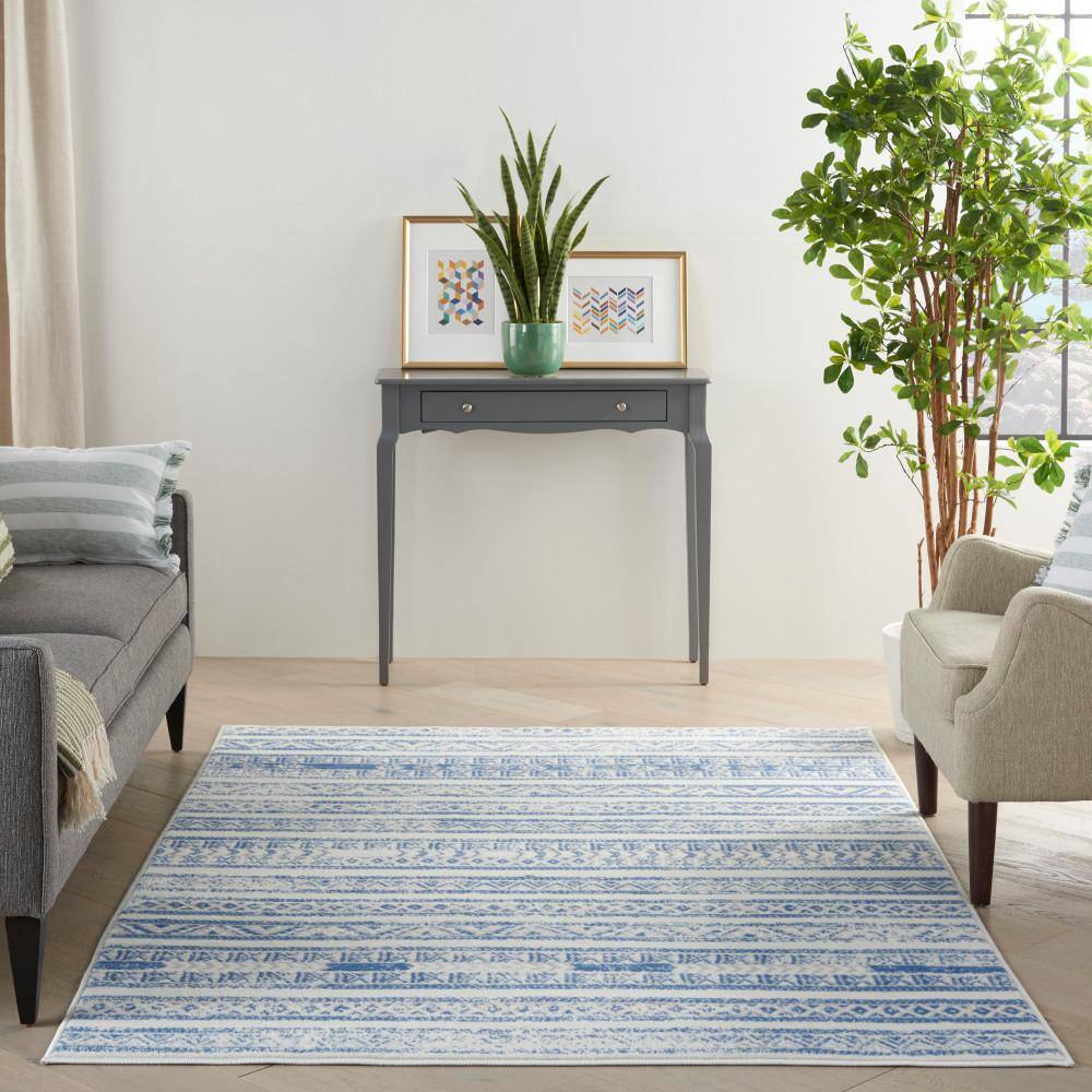 Ivory Blue Geometric Synthetic 6' x 9' Easy-Care Area Rug
