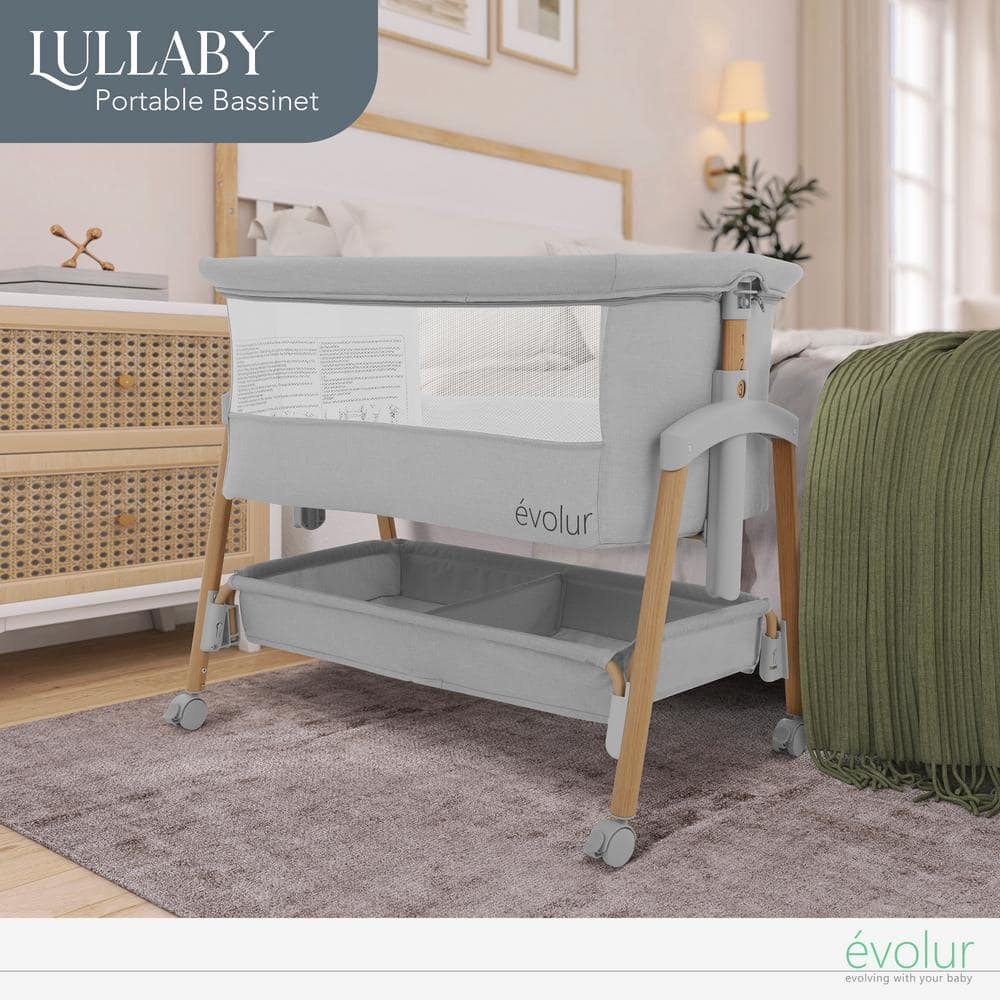 Light Gray Lullaby Portable Bassinet with wheels
