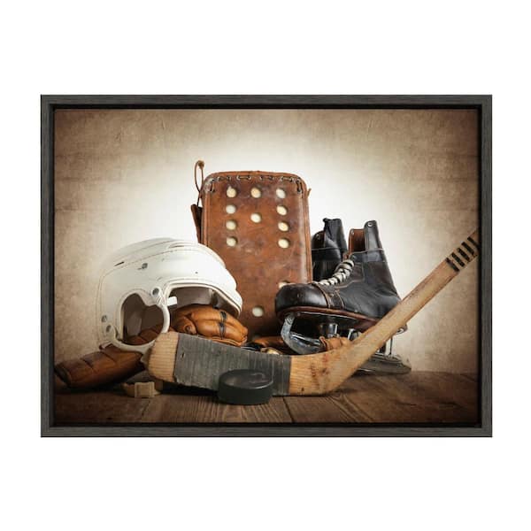 Sylvie "Vintage Hockey Gear" by Saint and Sailor Studios 24 in. x 18 in. Framed Canvas Wall Art