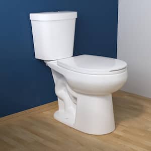 2-Piece 1.1/1.6 GPF Dual flush Round ADA Comfort Height Toilet in White Map Flush 1000g, Quiet-Close Seat Included