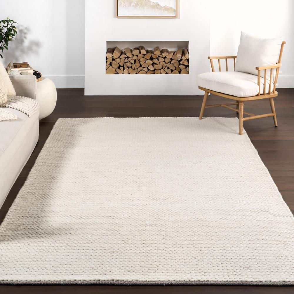 Handmade Off-White Braided Wool 5' x 8' Area Rug