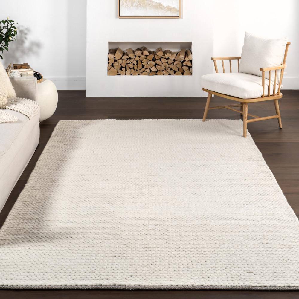 Handmade Off-White Braided Wool 5' x 8' Area Rug