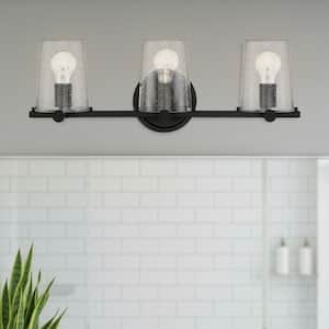 Matteson 24.75 in. 3-Light Matte Black Industrial Vanity Light with Clear Seedy Glass Shades for Bathrooms