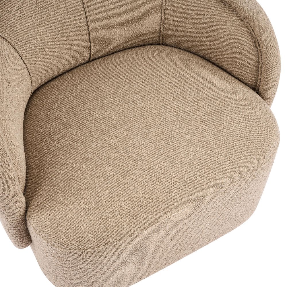 Close-up of the beige boucle fabric on an accent chair.