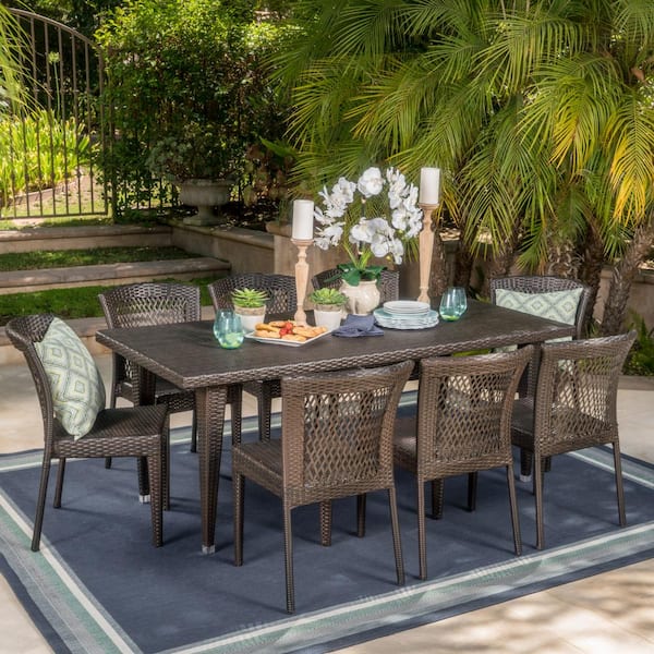 Noble House Mackenzie Multi-Brown 9-Piece Faux Rattan Rectangular Outdoor Dining Set with Stacking Chairs