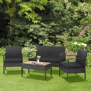 4-Pieces Wicker Patio Conversation Set Wooden Tabletop with Black Cushions
