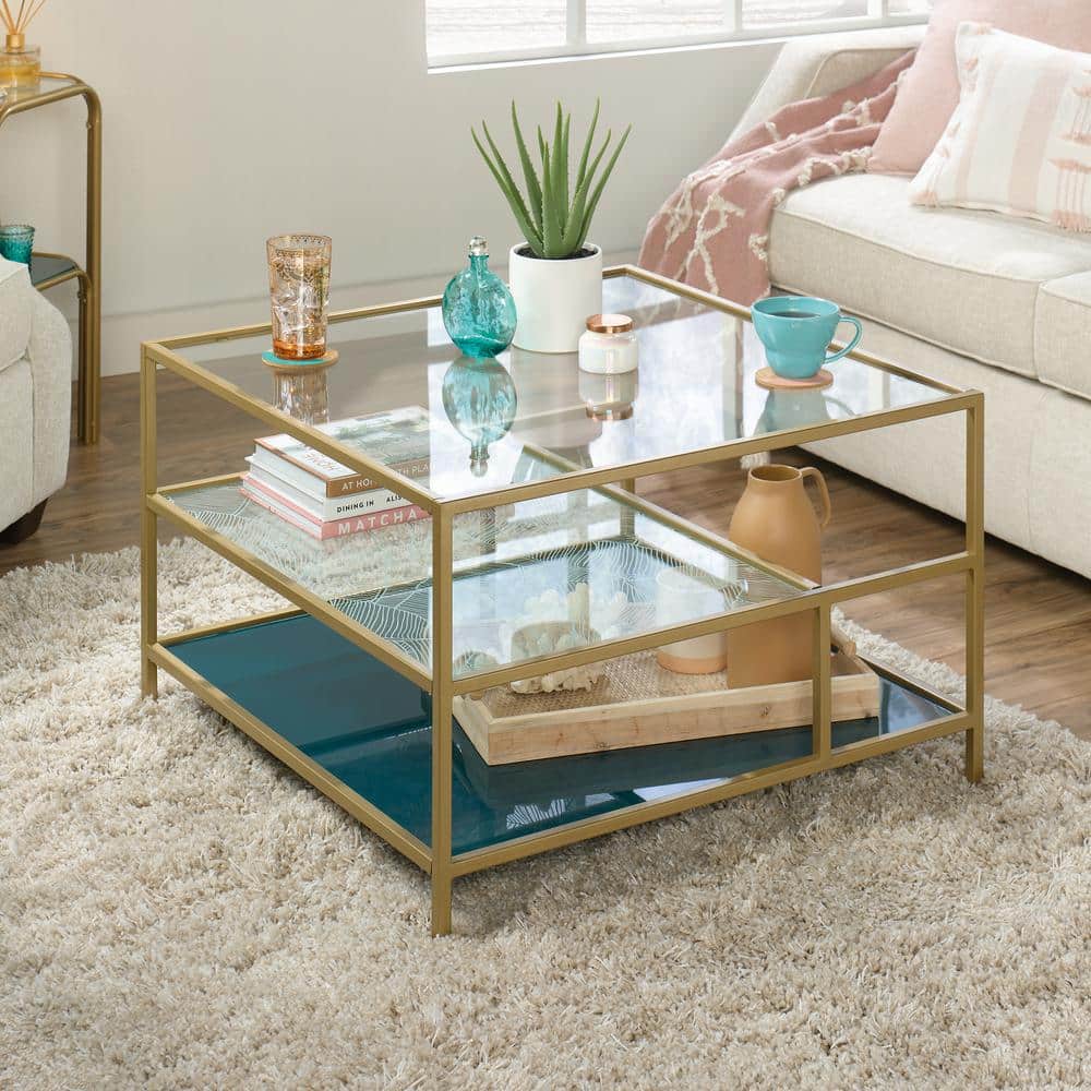 Satin Gold Square Coastal Glass Coffee Table with Abstract Shelves