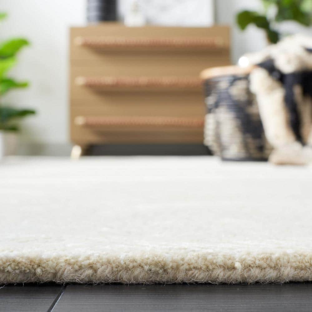 Ivory and Beige 9' x 12' Handmade Tufted Wool Viscose Rug