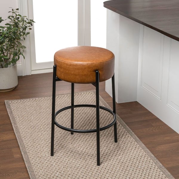 Paola 25.5 in. Modern Minimalist Round Backless Metal/Vegan Leather Cushioned Counter Stool, Caramel Brown/Black