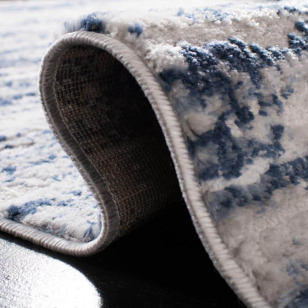 Amelia 8' Round Grey and Navy Abstract Synthetic Rug