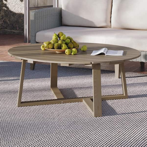 NEW CLASSIC HOME FURNISHINGS New Classic Furniture Carezza 45.5 in. Natural Oval Solid Wood Coffee Table