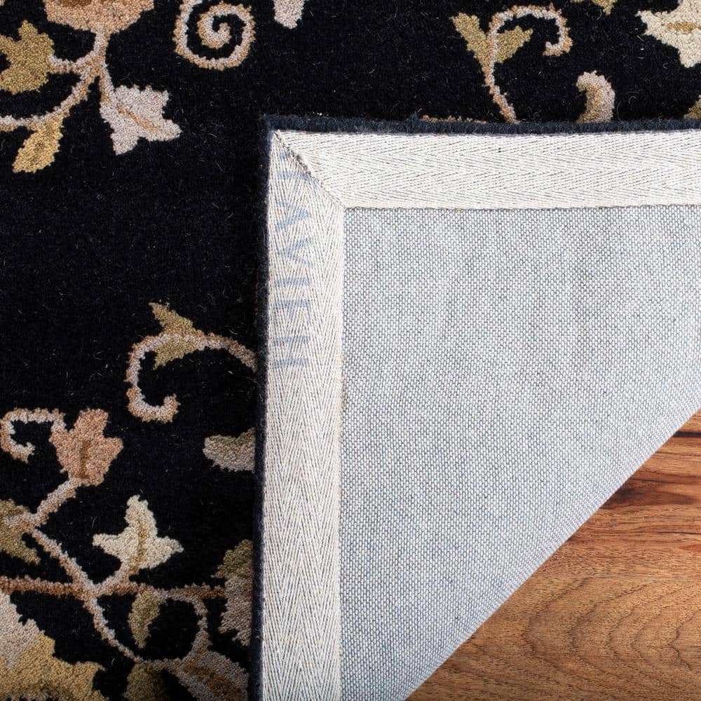 Elegant Heritage Black Wool 7'6" x 9'6" Hand-Tufted Area Rug