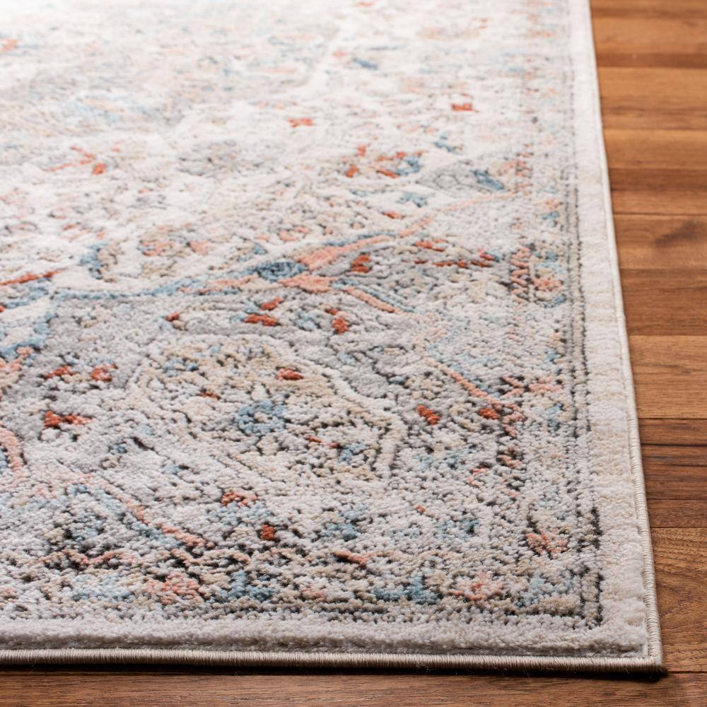 Ivory and Grey Medallion Synthetic 4' x 6' Area Rug