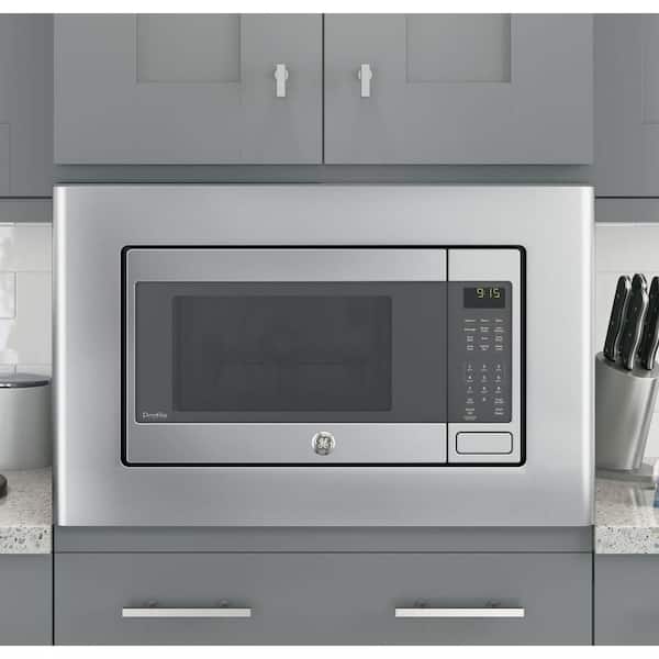 https://images.thdstatic.com/productImages/62279573-63aa-4c9a-9ccb-50ffc518dbc4/svn/stainless-steel-ge-profile-countertop-microwaves-peb9159sjss-77_600.jpg