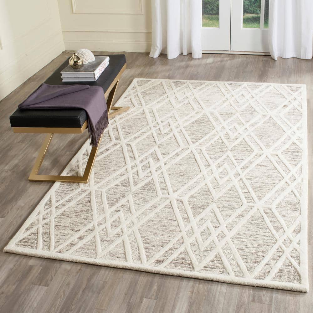 Hand-Tufted Wool Round Rug in Light Brown & Ivory, 3' x 5'