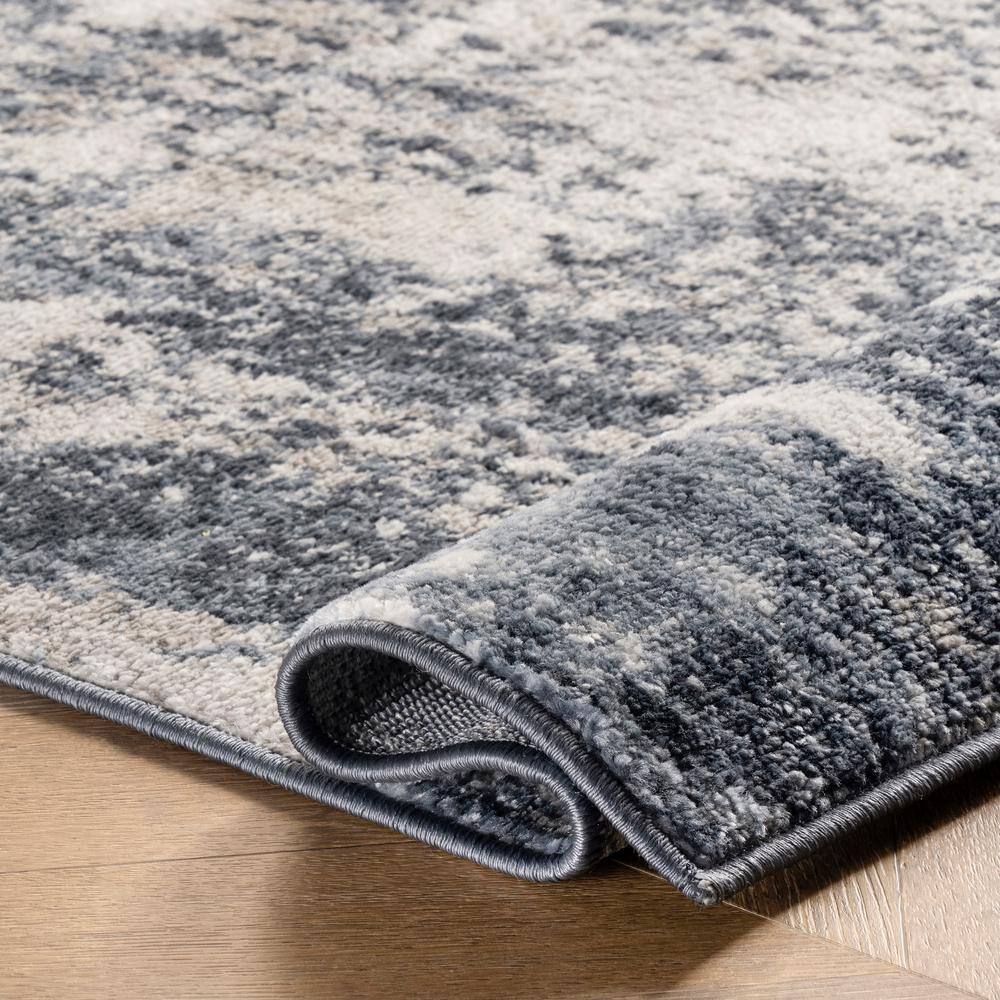 Reversible Abstract Blue Synthetic 4' x 6' Easy-Care Area Rug