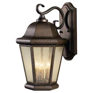 Martinsville 10.25 in. W 3-Light Corinthian Bronze Outdoor 17 in. Wall Lantern Sconce w/Clear Seeded Glass Panels