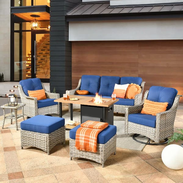 weaxty W Tulip B Gray 7-Piece Wicker Patio Storage Fire Pit Conversation Set with Swivel Rocking Chairs and Navy Blue Cushions