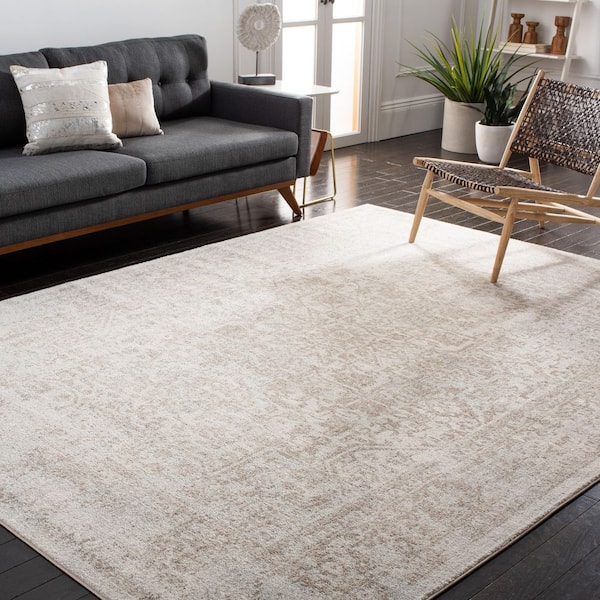 Evoke Ivory/Taupe 9 ft. x 12 ft. Distressed Border Medallion Area Rug