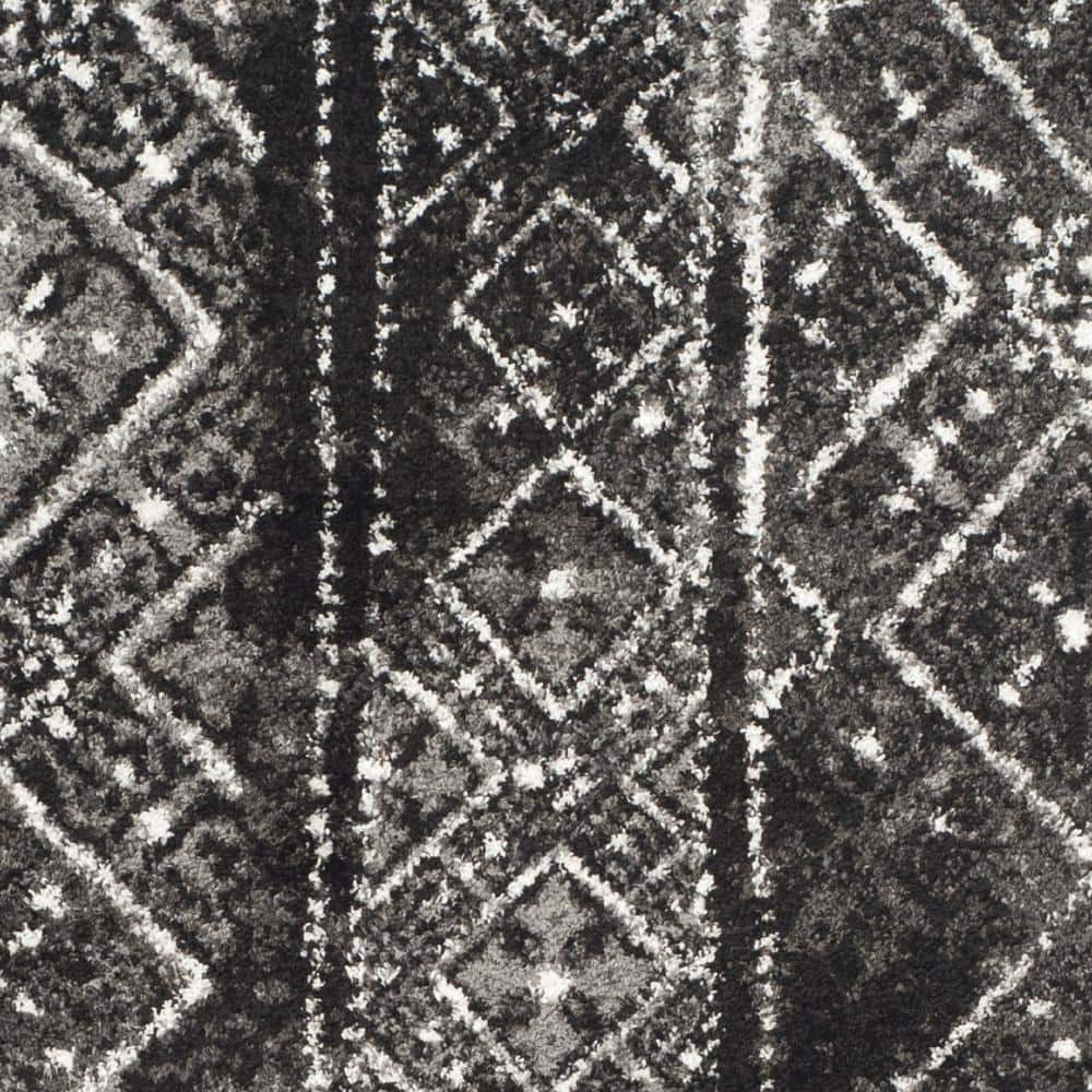 Reversible Black/Silver Geometric Synthetic Area Rug 6' x 9'