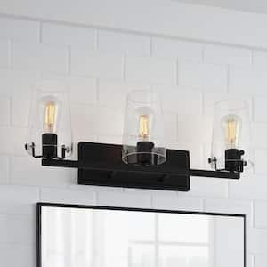 Creek Crossing 24 in. 3-Light Black Industrial Bathroom Vanity Light with Clear Glass Shades