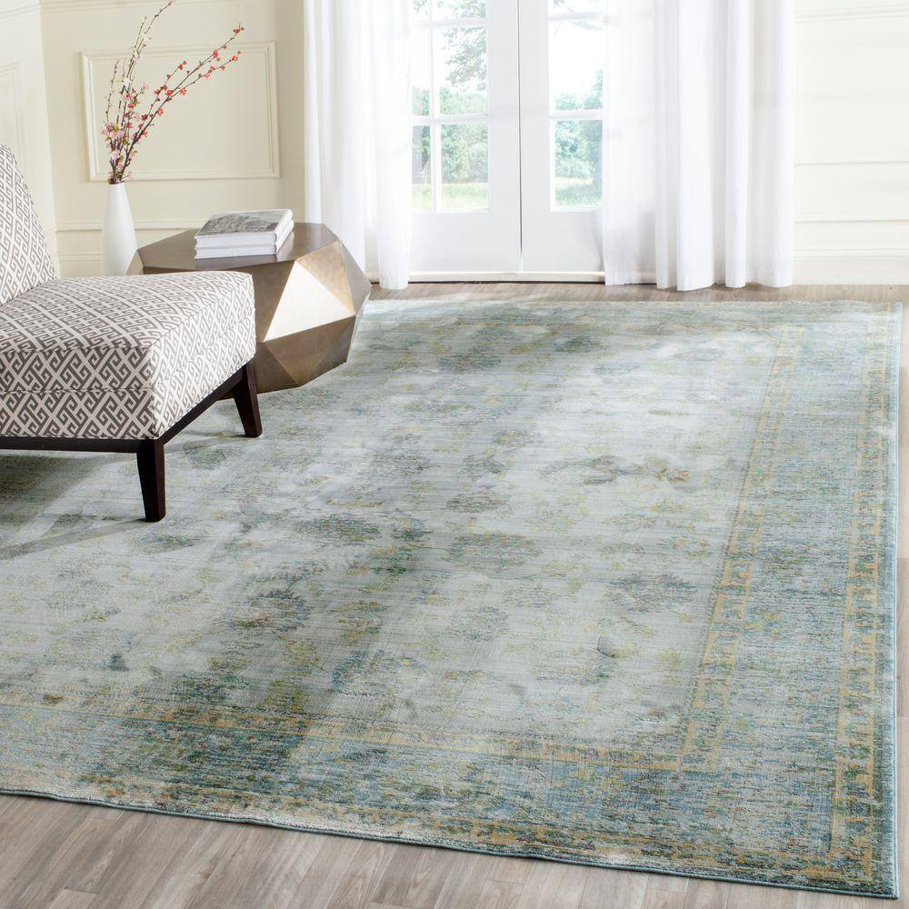 Reversible Light Blue/Turquoise Synthetic 9' x 12' Area Rug