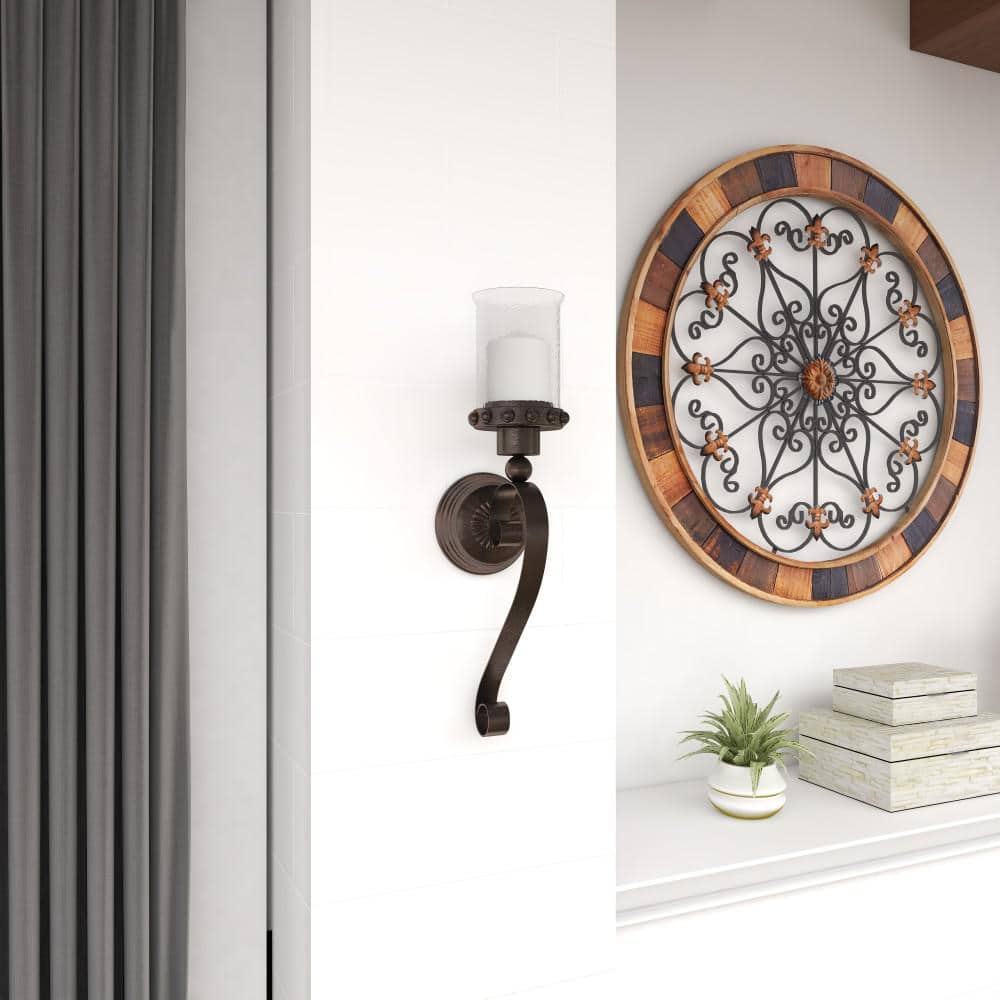 Brown Metal Scroll Wall Sconce with Glass Hurricane