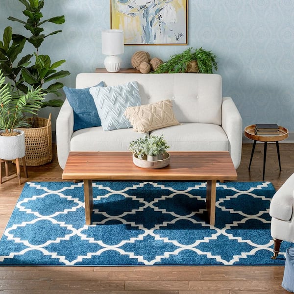 https://images.thdstatic.com/productImages/62fb1692-b4cc-46f3-82dc-ac9c1bde145a/svn/navy-blue-well-woven-area-rugs-21047-fa_600.jpg