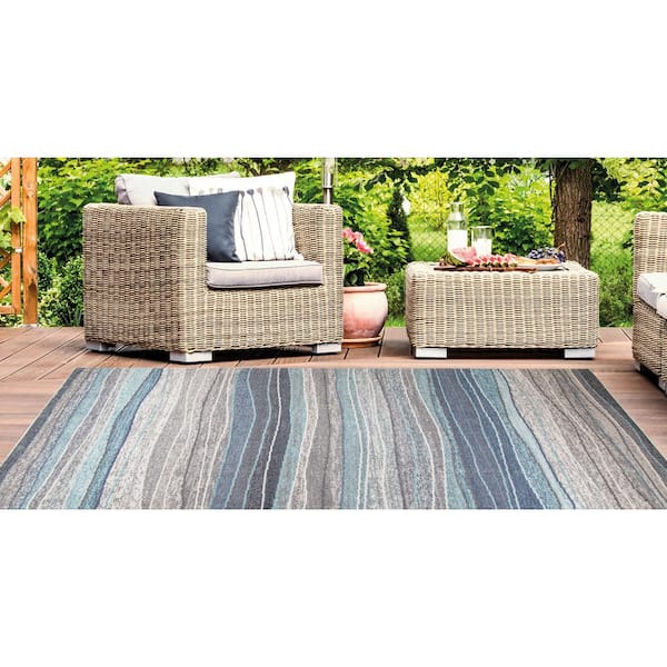 https://images.thdstatic.com/productImages/63123723-45c1-4cb2-b94c-da84269d6850/svn/multi-stylewell-outdoor-rugs-40165-c3_600.jpg