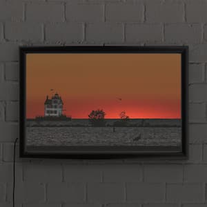 "Lake Erie's Lorain lighthouse at sunset" by Kurt Shaffer Framed with LED Light Landscape Wall Art 16 in. x 24 in.