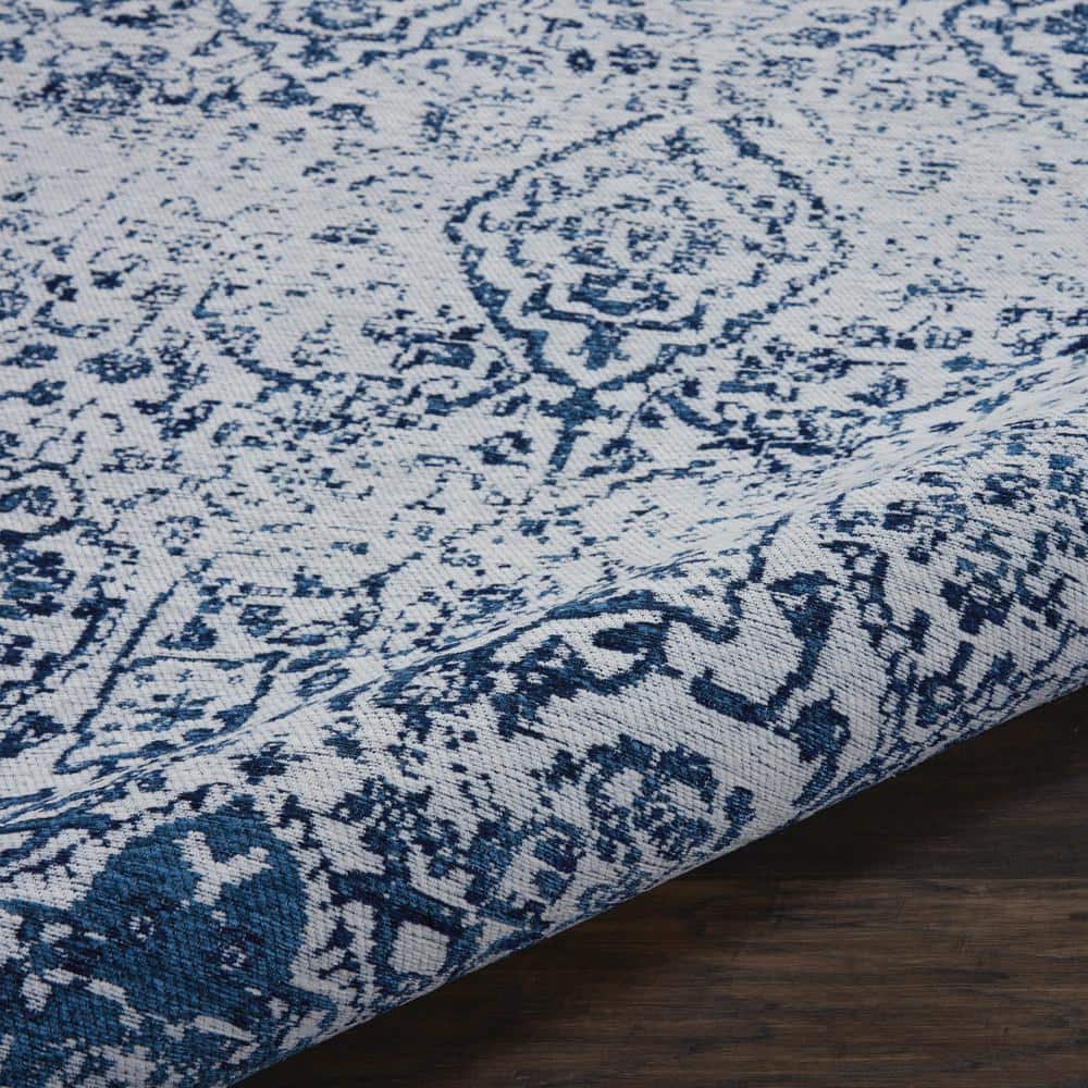 Ivory and Navy Medallion Synthetic 4' x 6' Area Rug