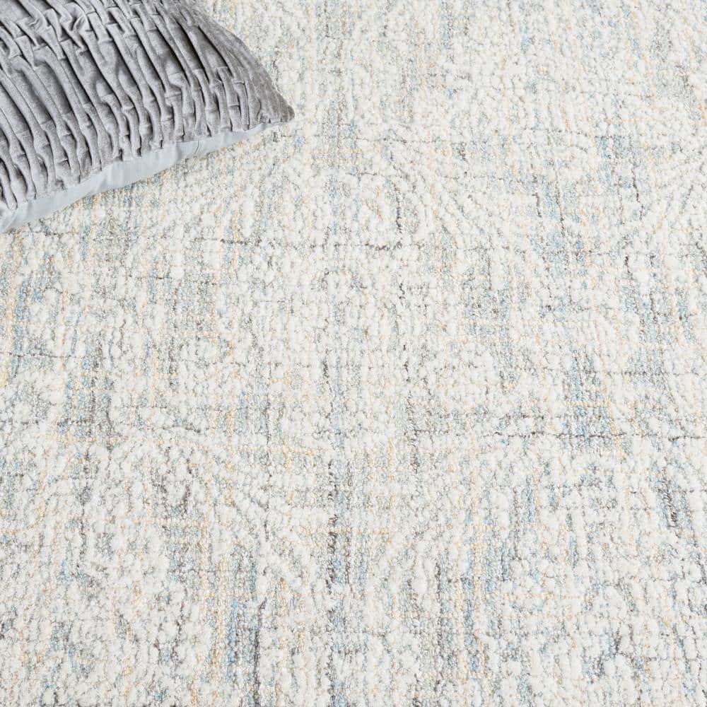 Ivory and Light Blue Tufted Wool 4' x 6' Area Rug