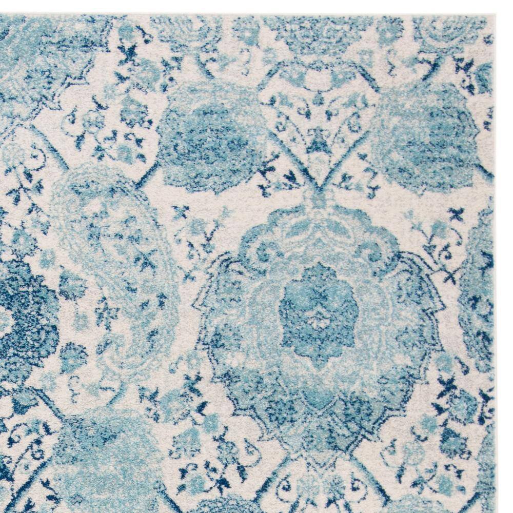 Beige and Turquoise Synthetic Reversible 8' x 10' Area Rug