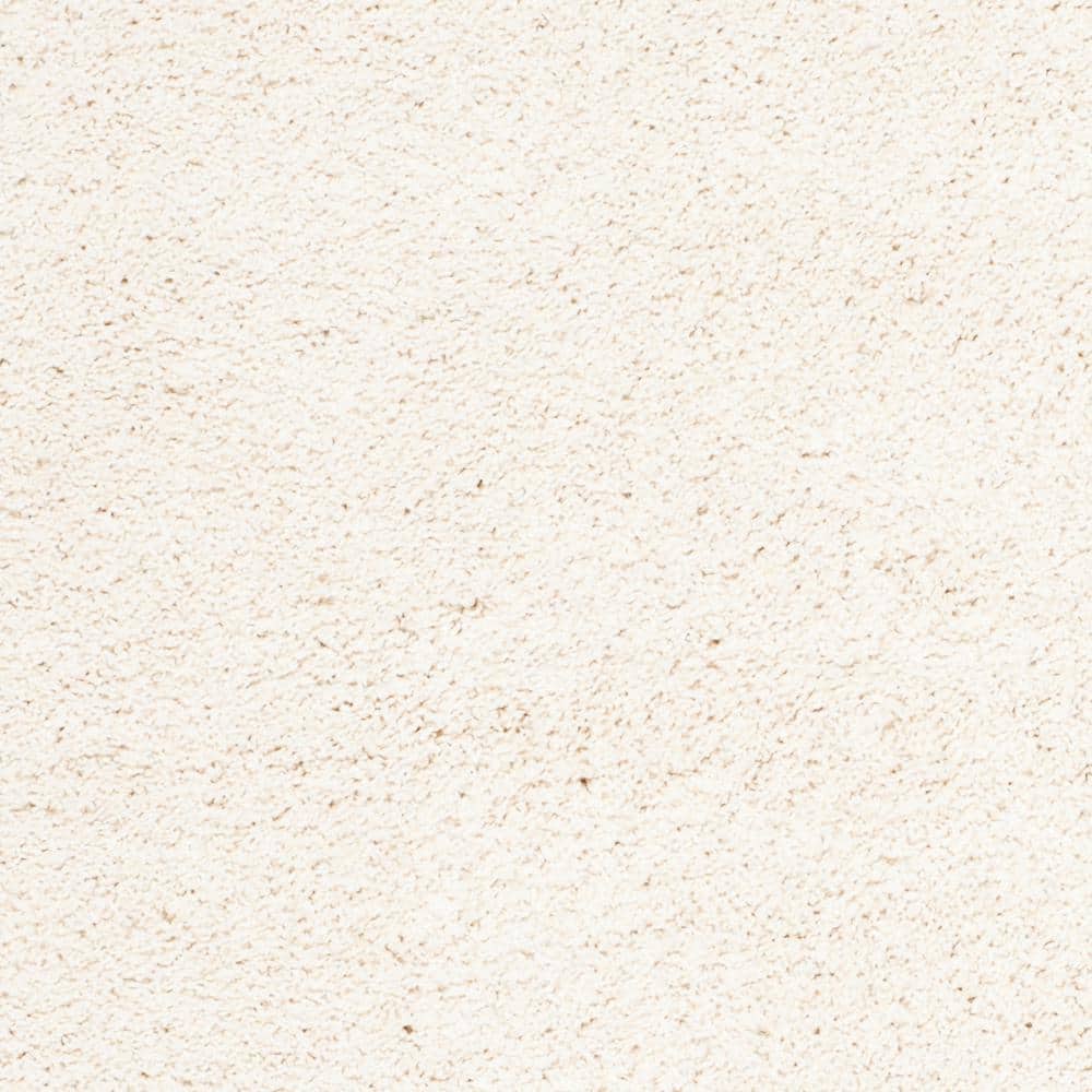Ivory 8' x 10' Reversible Solid Shag Synthetic Rug