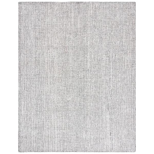 Abstract 10 ft. x 14 ft. Ivory/Black Solid Color Area Rug