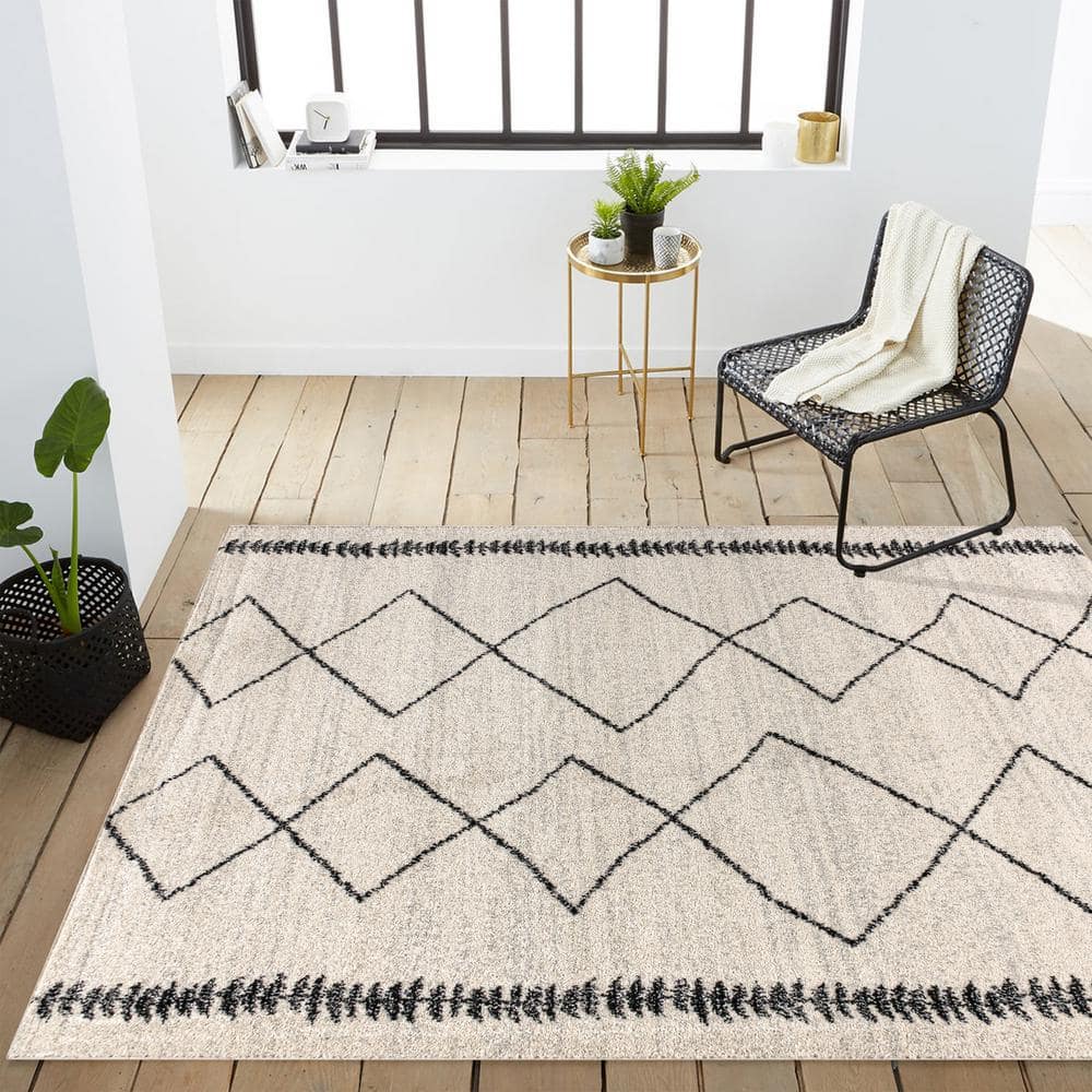 Zaina 8' x 10' Black and Cream Geometric Synthetic Area Rug